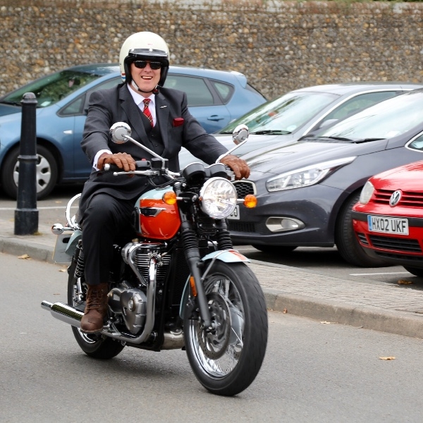Dean riding his Bonneville
